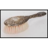 A 20th century cased silver hallmarked babies brush and comb set,