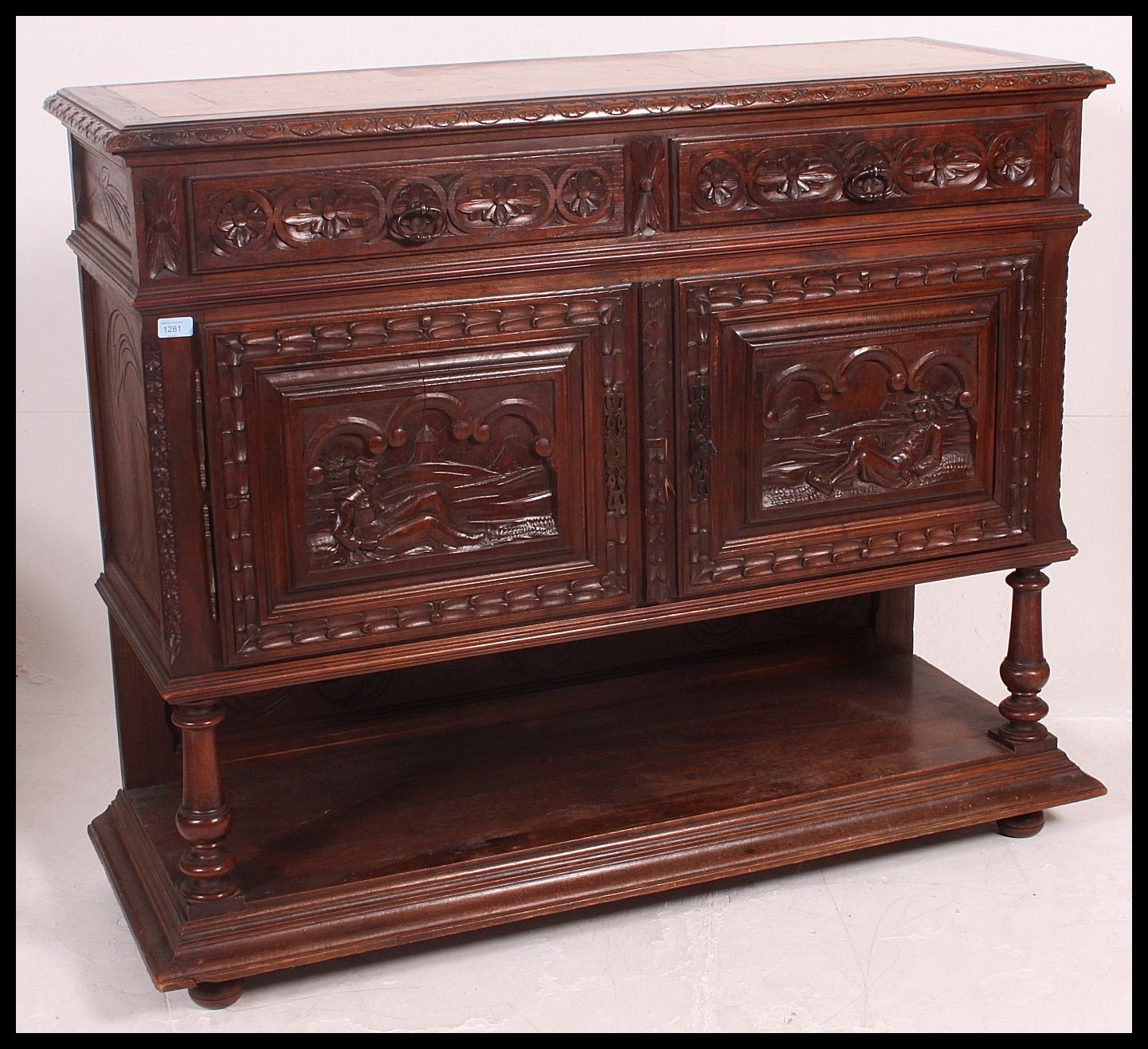 A 19th century Jacobean carved oak green man revival marble top sideboard / buffet. - Image 2 of 6