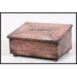 A hand beaten scratch built early Edwardian copper slipper box along with an oak arts and crafts