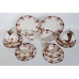 A good early 20th century Imari pattern tea service comprising cups saucers plates etc by Anchor