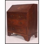 An Edwardian mahogany inlaid bureau.