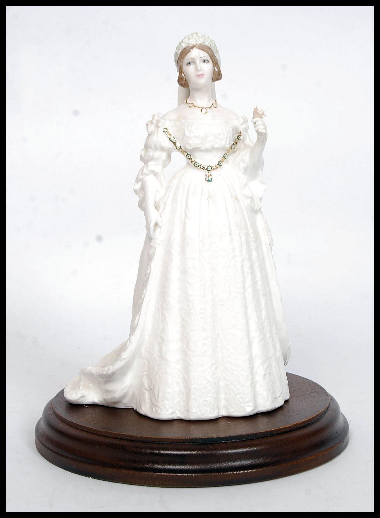 An original Coalport Compton & Woodhouse Limited Edition Queen Victoria figurine.