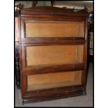 An Edwardian mahogany 3 tier lawyers - barristers stacking bookcase cabinet in the manner of Globe