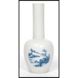 A Chinese blue and white 19th century ribbed vase.