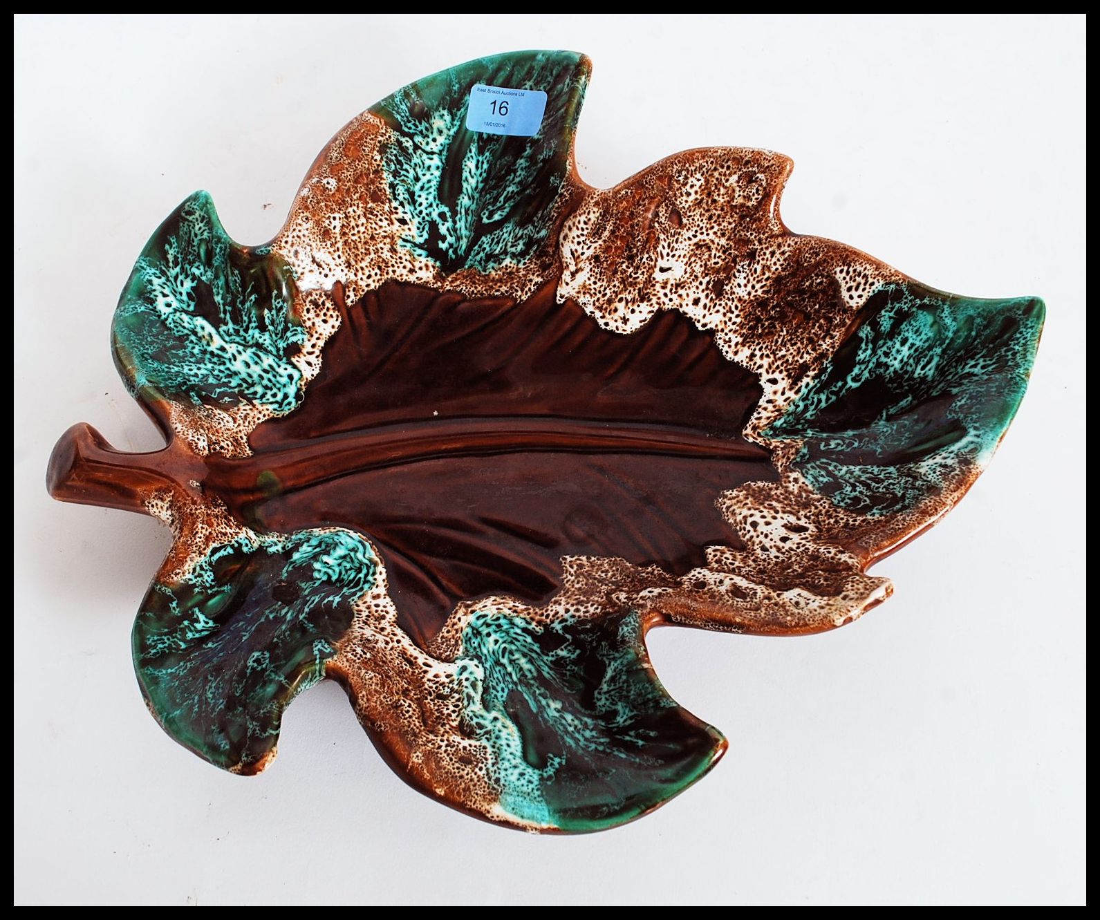 A retro 20th century large Vallauris of Portugal large majolica leaf dish. Impressed stamp to base.