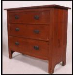 An Edwardian pine cottage chest of drawers. The flared top over 2 short and 2 deep drawers.