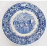 A Wedgwood large blue and white charger stamped to the reverse Ferrara with other impressed marks.