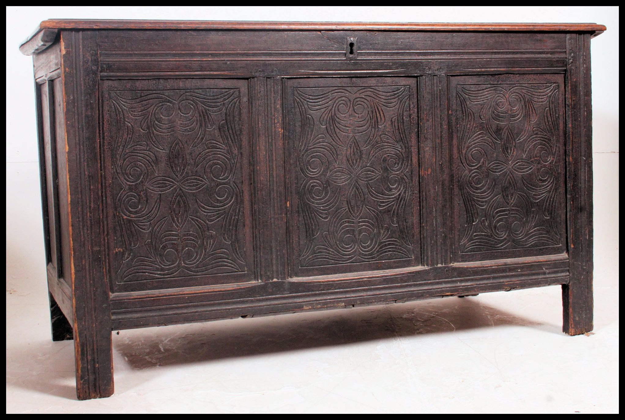 An early 19th century  large carved country oak coffer chest / blanket box.