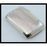 An Edwardian silver hallmarked cigarette case with makers marks FF in two diamonds.