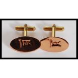 An unusual pair of gentlemans cufflinks crafted from the copper taken from the wreck of HMS White