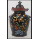 A large lidded StaffordshireChinese style pot,