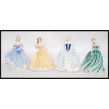 A collection of 4 Royal Doulton figures -  Figure of the Year Classics Collection.