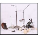 A collection of vintage / retro / industrial lights and light fixtures along with stands please see