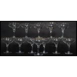 A set of twelve vintage /  retro collectable advertising Babycham glasses,