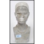 An African believed Zimbabwe carved stone bust of a Shona woman with beaded necklace.