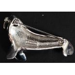 A vintage D'Orlan white metal brooch in the form of a walrus.