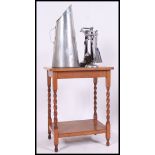 An early 20th cenutry oak barleytwist side - lamp  table together with a chrome coal scuttle and a