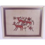 A large framed and glazed batik / screen print on cotton of deers eating foliage