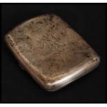 A Victorian silver hallmarked cigarette case with monogram to centre.