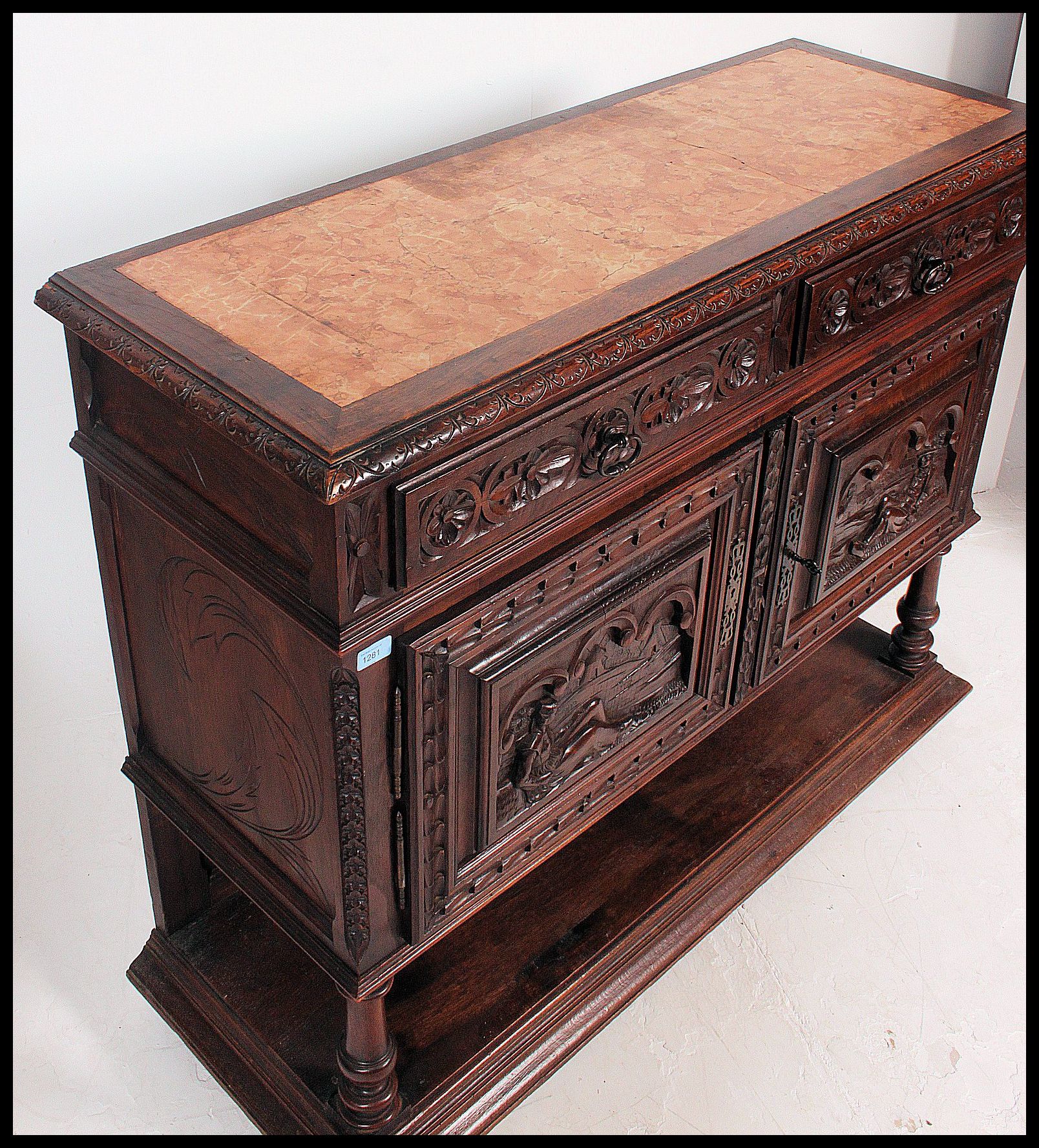 A 19th century Jacobean carved oak green man revival marble top sideboard / buffet. - Image 3 of 6