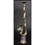 A Tibetan / Nepalese white metal temple candlestick - sconce stand.