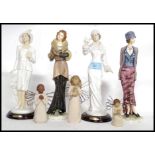 A collection of ceramic  - resin figurines to include Regal and Willow Tree ( see illustrations )