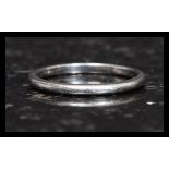 A 20th century Platinum band ring of plain simple form. Total weight 2.