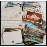 A collection of postcards mainly from the 20th century to include early black and white examples