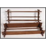 A pair of 20th century country beech wood wall shelves,