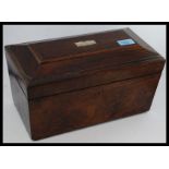 A good large 19th century rosewood sarcophagus shaped tea caddy.