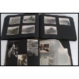 An early 20th century black and white photograph album to include scenes from 1940 in the Lake