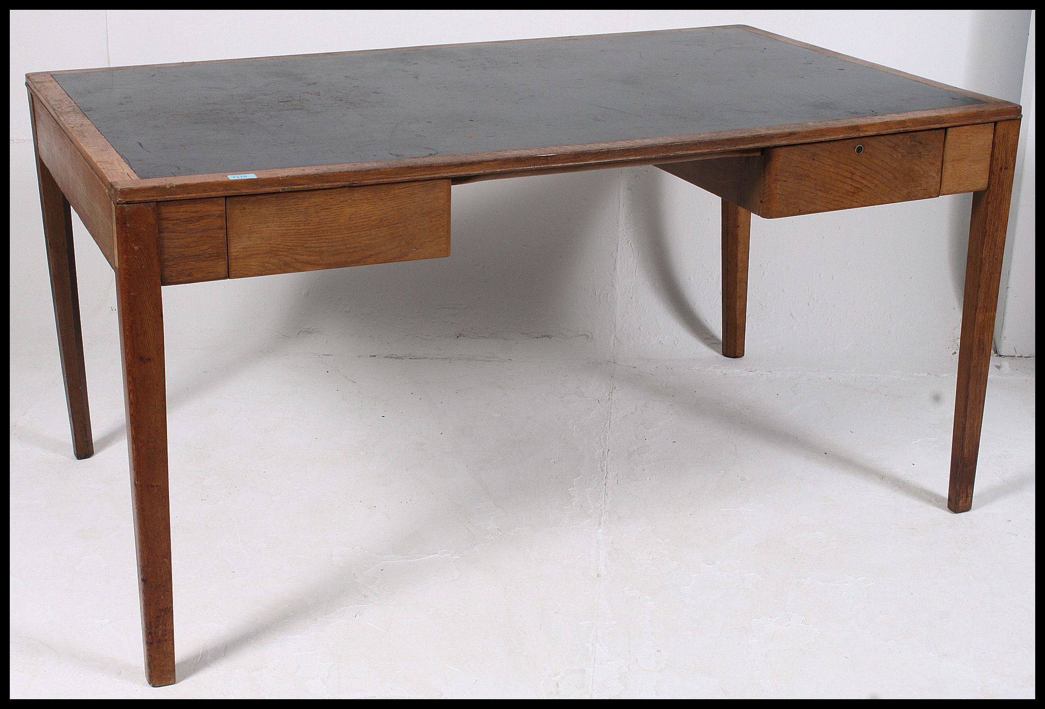 A mid century golden oak Air Ministry military desk raised on tapered legs with drawers to the - Image 2 of 6