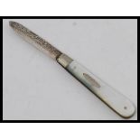 A Victorian silver hallmarked mother of pearl fruit knife - pen knife.