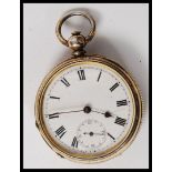 A white metal ( marked ' fine silver ' ) enamel faced pocket watch.