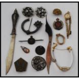 A mixed collection of items to include; a Siam Sterling marked letter opener,