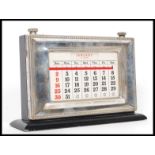 A silver hallmarked Asprey of London desk top calendar. Hallmarks for London 1990.