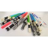 STAR WARS; A collection of 12x Star Wars toy weapons (11x Lightsabers and 1x blaster ) Each unboxed,