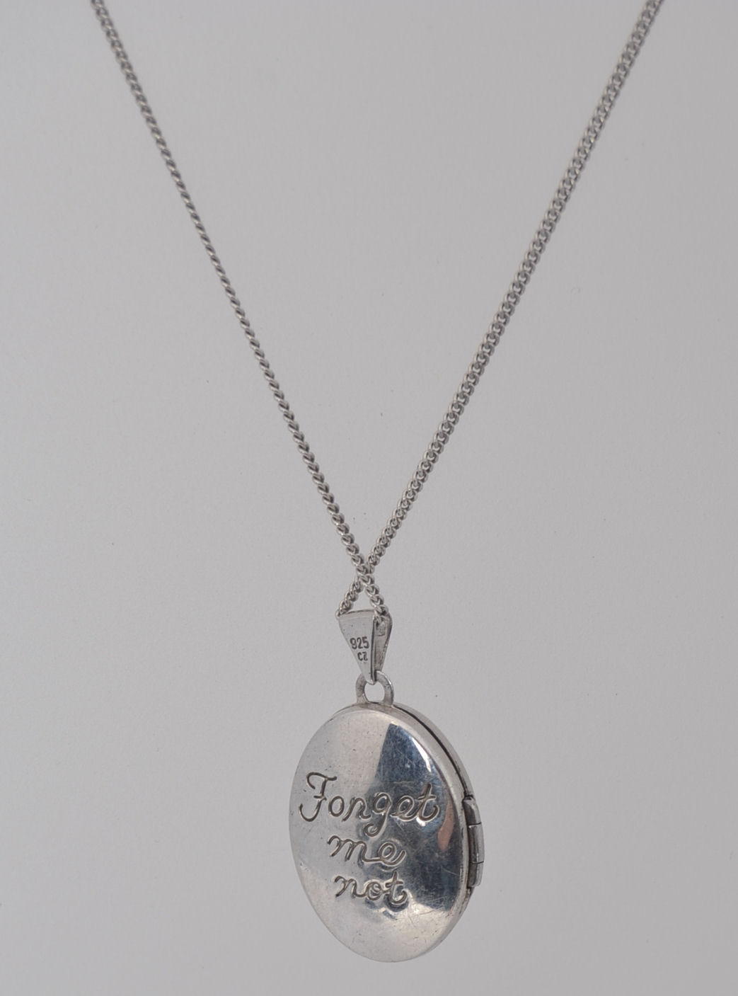 A ladies silver locket forget me not necklace. - Image 2 of 3