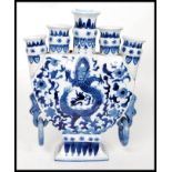 A Chinese blue and white five planter mo