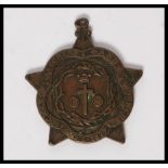 An unusual Victorian bronze medal awarde