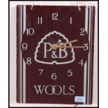 An original vintage P&B Wool advertising shop display clock, of glass construction,