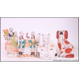 A collection of Staffordshire wares to include flatback diorama figurines x 2,