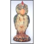 A tobacco jar canister in the form of a grotesque bird, in the style of Martin Brothers.