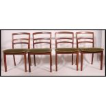 A good set of 4 vintage retro dining chairs by G-Plan raised on shaped legs with overstuffed seats