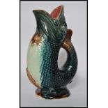 A 19th century Majolica fish pitcher jug - gurgle. Unmarked to base retaining vibrant colours.