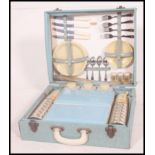 A 1960's baby blue cased four persons  Picnic set by Sirram,