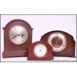 An oak cased bracket clock with 8 day movement striking on a chime together with a mahogany cased