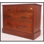 An Edwardian ash 2 over 2 cottage chest of drawers.