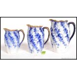 A set of 3 19th century blue and white graduating jugs buy Ridgway in the Windsor pattern.