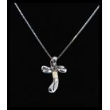 An 18ct white gold crucifix cross and necklace chain. The top and cross with 1pnt diamonds.